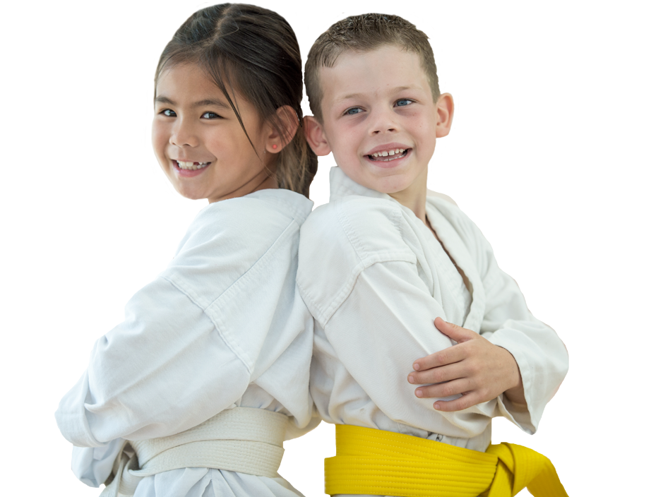 young girl and boy in karate uniforms